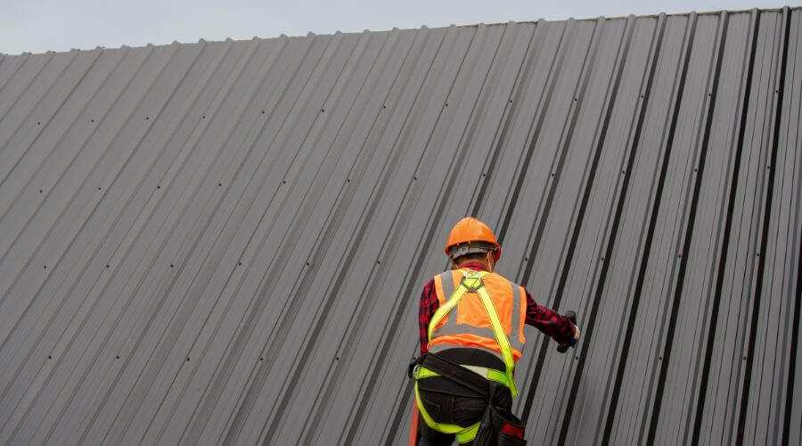 Professional metal roof installation services in New Century, KS